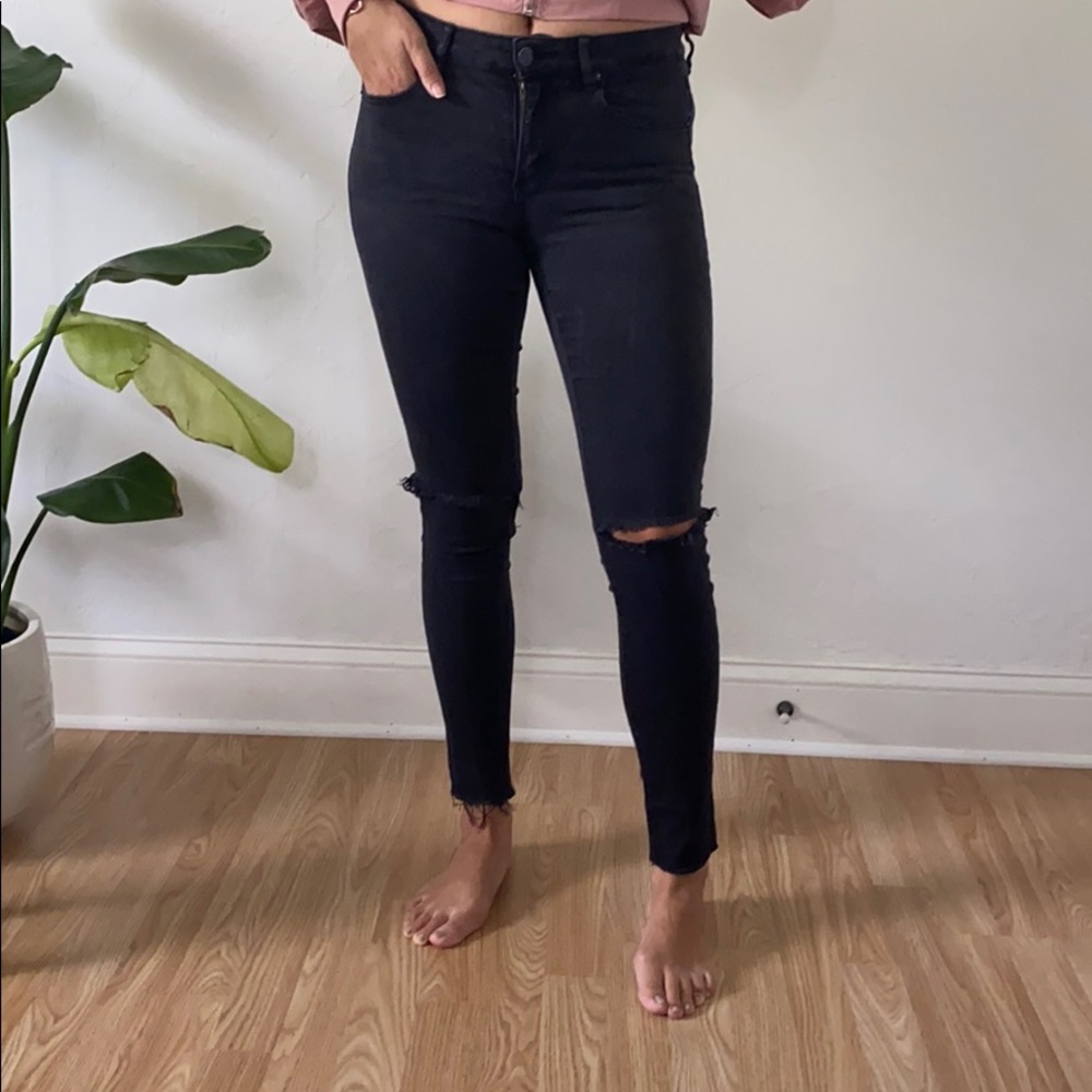 Garage skinny jeans with rips in washed black